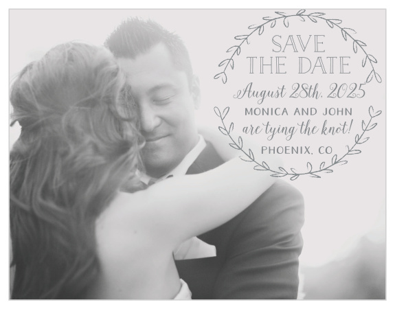 A simple laurel of leaves surrounds your text on the Rustic Love Save-the-Date Cards. 