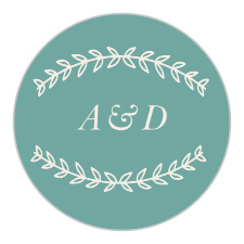A simple foliage wreath adorns your initials on this simply rustic design. 
