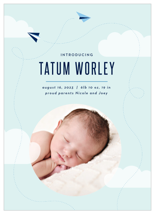 Planes zip around your newborn’s photo on the Paper Planes Birth Announcements. 