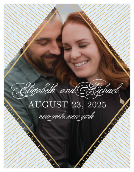 Rays emanate from your engagement photo on the Dazzling Diamond Foil Save-the-Date Cards. 