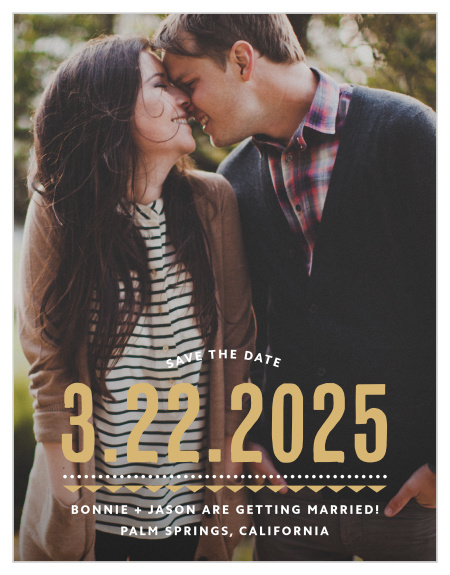 Deco Charm Foil Save-the-Date Magnets begin with a photo of the two of you as their foundation, add the date of your wedding in a stunning glass-blue, and then finish with the other details of your wedding in small, sheer white typeface at the bottom.