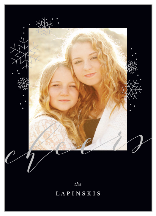 On the rich black background of our Charcoal Chic Foil New Year Cards, adorned with metallic foil snowflakes and typefaces, is a gorgeous photo of your family.