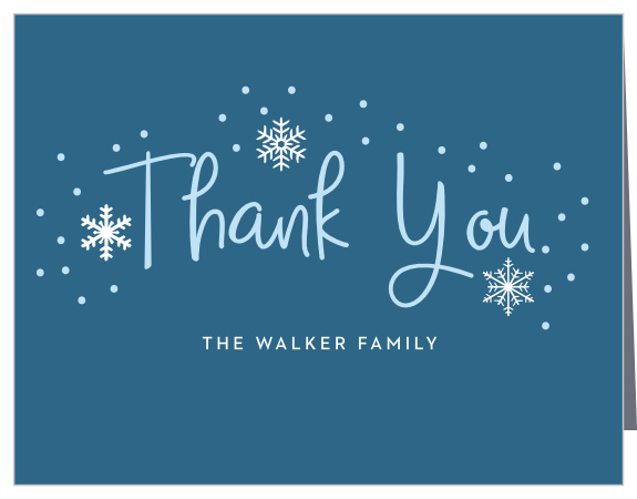 Handwritten Joy Holiday Thank You Cards are reminiscent of a beautiful winter day with a blue sky colored, handwritten font that's set against a lagoon blue background, surrounded by intricate illustrations of snow