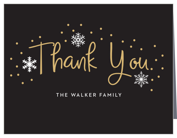 Handwritten Joy Foil Holiday Thank you Cards are reminiscent of a beautiful winter night with a gold-foiled, handwritten font that's set against a rich black background, surrounded by intricate illustrations of snow.