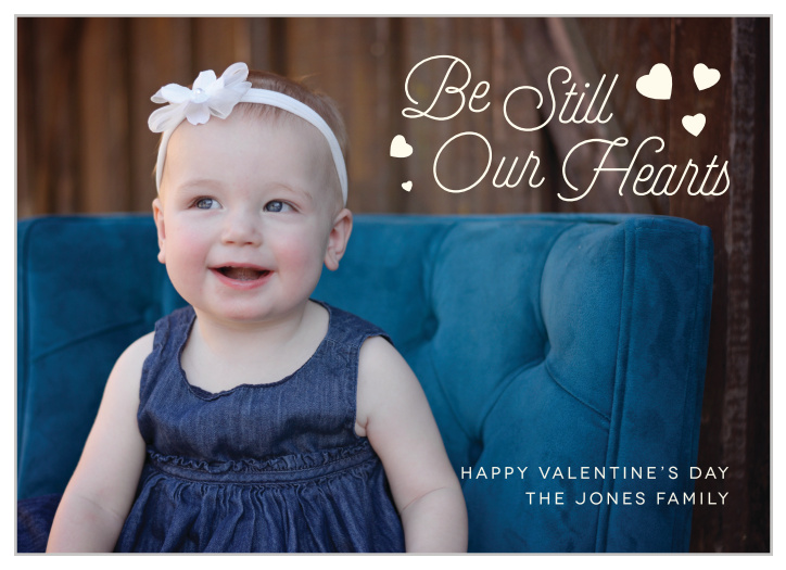 The Our Hearts Valentine's Day Cards use your photo as the backdrop, with a retro script  and tiny hearts decorating the top corner.