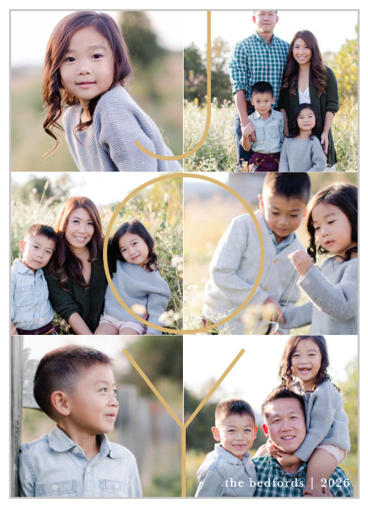 The Our Year Holiday Cards allow you to add 6 of your most cherished photos as the background of the design, topped by a thin-lined "JOY" in gold foil. 