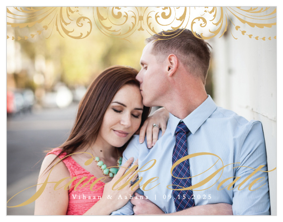 Embellished Love Save-the-Date Cards offer an unforgettable reminder for your friends and family of your wedding day. Your favorite photo decorates its background, forming the perfect complement to the intricate gold-foil designs along the top border. With a swooping, swirling calligraphy for your title and a neat white print for the details that matter most, these stunning cards match your wedding style effortlessly.