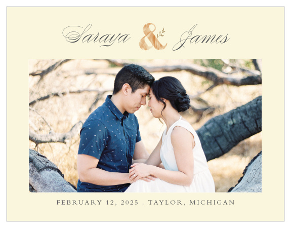 Give your guests the information they need to enjoy your wedding day with you with one of our Rustic Ampersand Save-the-Date Cards. Your favorite photo adorns its center, underlined by your wedding date and location in a clean-cut black print. With your names swirling along the top, joined together by a beautiful wooden ampersand, these cards are a beautiful ornamentation for your guests' homes.