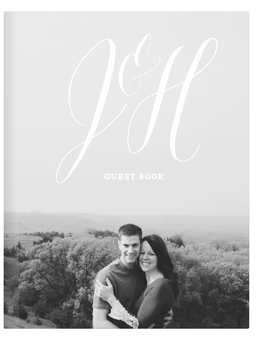 You'll love the monochromatic theme of the MaeMae's Jett Photo Guest Book.