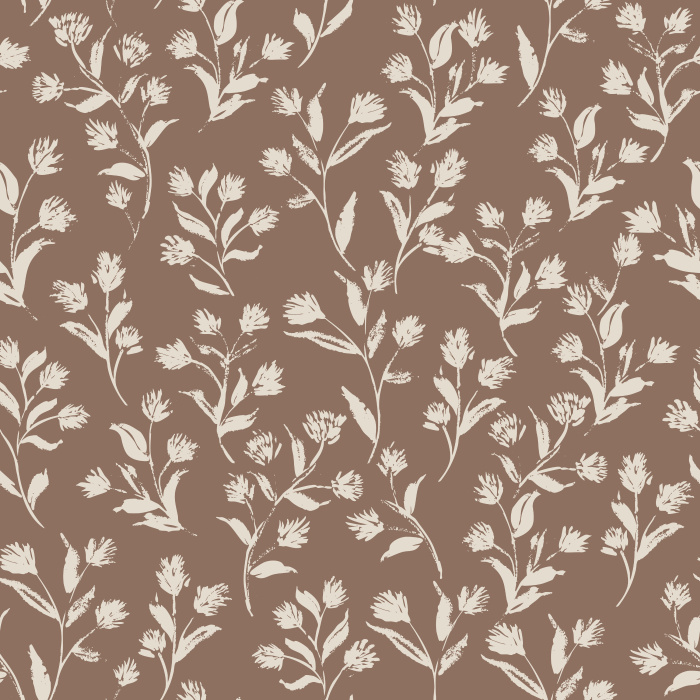 Create a warm, welcoming atmosphere with Golden Flourish wallpaper, featuring a charming botanical sprig pattern in soft cream on a golden brown background.