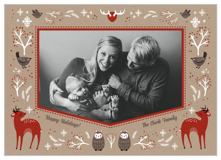 This gorgeously illustrated holiday card is full of custom woodland winter animal illustrations on a rustic kraft background. 