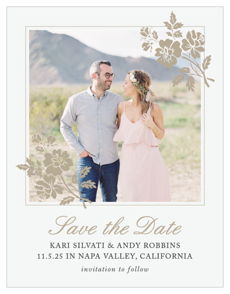 Delicate flower illustrations decorate the corners of your picture on the Rose Stamped Photo Save-the-Date Magnets.