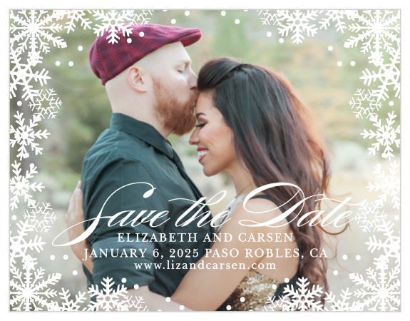 Graceful Snowflakes dust the edges of your photo on the Shimmering Snowflakes Save-the-Date Cards. 