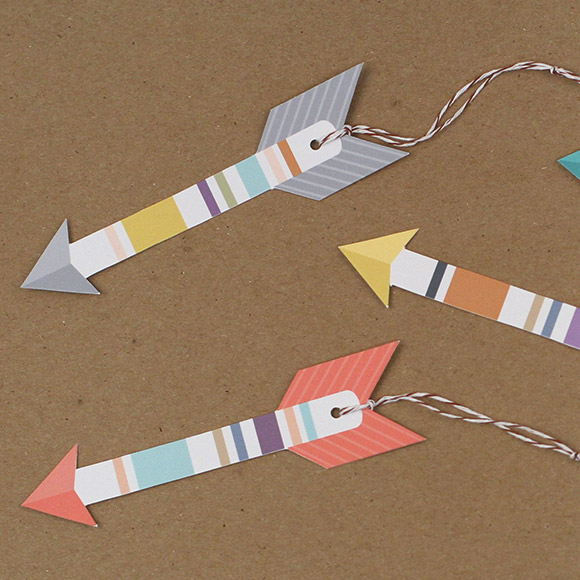 Why not change up the standard gift tags by using colorful arrow shaped gift tags. These tags will adorn any of your holiday packages and gifts. This printable template comes with 5 pretty color ways. There is room for a short personal message on the back of the gift tag. All you have to do is download the PDF and print the file via Adobe Acrobat. Cut out the different shapes, punch a hole in the top and attach a fun piece of twine. Have fun!! 