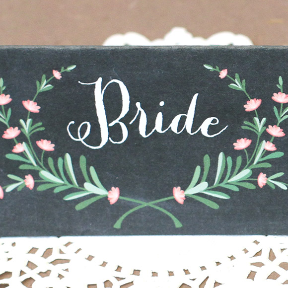 These chalkboard place cards are a nice way to show where the bride and groom will sitting. The size of these folded cards is 3.5" x 2" and they are set up 2 on a page. Available to print at home or at a local print shop, these place cards are easy as cake to create!This is a Digital Item for you to print on your own, no printed cards will be mailed to you.&nbsp;After you purchase this item, you'll receive a confirmation email. In this email click on the link "Bride and Groom Place Cards PDF" to instantly download your PDF.