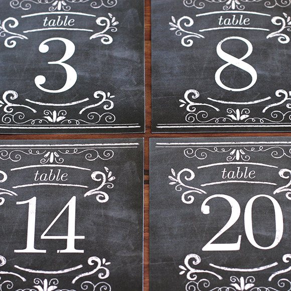 Size: 5" x 5" | 127mm x 127mmThese Chalkboard Table Numbers are a practical and pretty decoration for your wedding table. Available in the numbers 1 through 20, these printable wedding table numbers are easy to print on your own personal printer, or you can have them printed at a local print shop or copy center. This PDF is set up with 2 table numbers on a page with crop marks. To keep our prices low we're unable to customize the wording or color of this printable.It's very easy to purchase the PDF of these Chalkboard table numbers:Step 1: Add this item to your cartStep 2: Go through the Secure Check OutStep 3: Within minutes you'll receive an email with a link to download your PDF.Its easy to print and cut these items:Step 1: Open your PDF in either Acrobat, Photoshop or Illustrator.    Step 2: Print on 8.5" x 11" or A4 cardstock.Step 3: Trim using crop marks with an X-Acto knife or paper cutter.