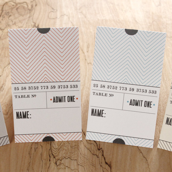 Size: 3.5" x 5" (folded)After last week's DIY Ticket Place Cards several Basic Invite friends and family members asked for more. This week you can download, print and create Ticket Place Cards that are freestanding.